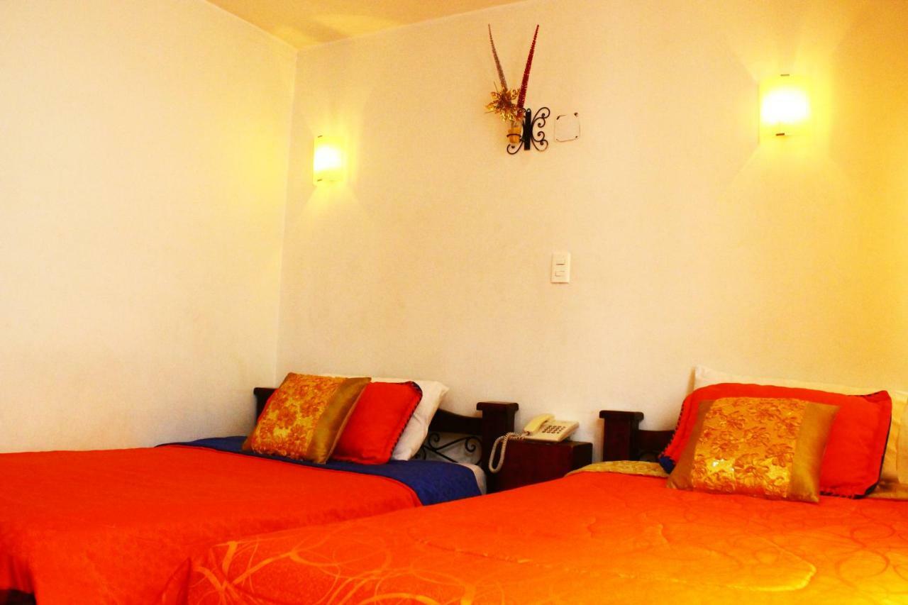 מניזאלס Hotel Royal Suite מראה חיצוני תמונה